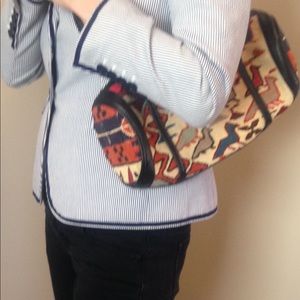 Totally unique purse made from hand woven rug.